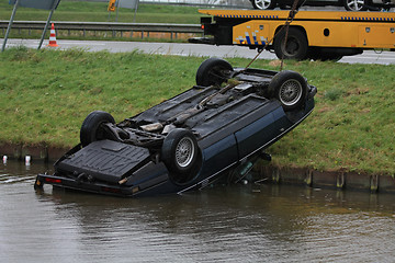 Image showing Car in water after an accident