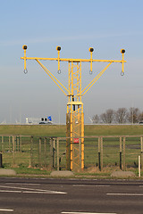 Image showing Traffic lights near an airport runway