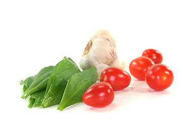 Image showing Wild garlic with tomatoes and garlic