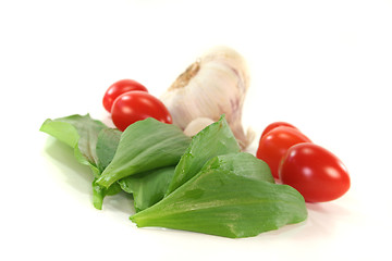 Image showing Wild garlic with tomatoes and garlic