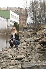 Image showing Woman by City River