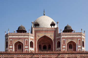 Image showing Upper structure of the Humayun tomb peeping over the edge of the platform.