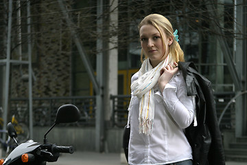 Image showing Woman with Moped