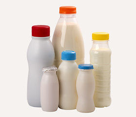 Image showing different types bottles for milk and yogurt