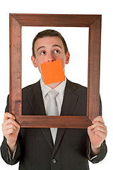 Image showing Businessman with wooden frame