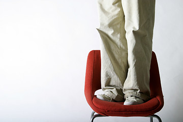 Image showing Feet on a Chair