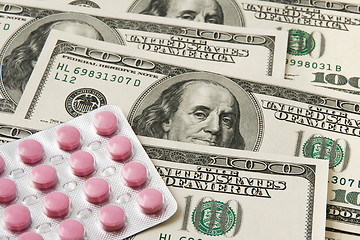 Image showing Pills package on money background