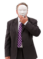 Image showing Man covering his face with mask