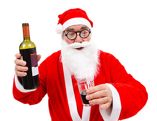 Image showing Drunken Santa Claus with wine bottle