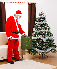 Image showing Santa Claus bringing gas as present