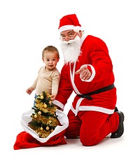 Image showing Santa claus and little boy looking at us