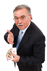 Image showing Senior man showing royal flush