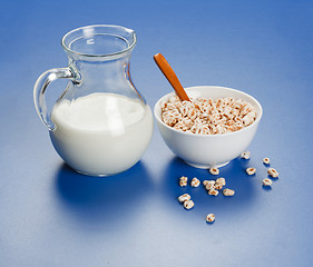 Image showing Popped wheat flakes and milk