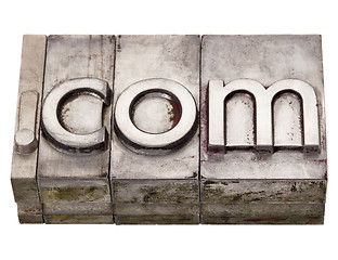 Image showing dot com - internet domain in letterpress type