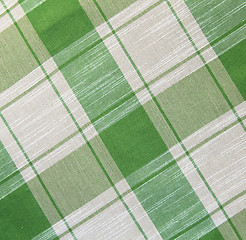 Image showing Beige and green linen fabric as background 