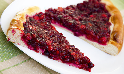 Image showing Two pieces of apple and cowberry jelly pie 