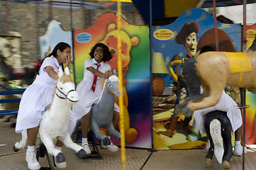 Image showing Girls on carusel