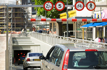 Image showing cars driving into underground car park