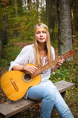 Image showing Guitar Player Girl