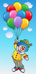 Image showing Flying clown with cartoon balloons