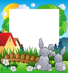 Image showing Spring frame with two rabbits