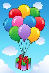 Image showing Floating gift with cartoon balloons