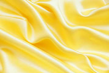 Image showing Smooth elegant golden silk as background 