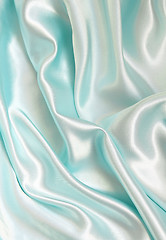 Image showing Smooth elegant blue silk as background 