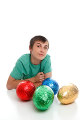 Image showing Boy with chocolate easter eggs