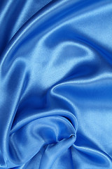 Image showing Smooth elegant blue silk as background 