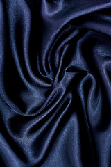 Image showing Smooth elegant black silk as background 