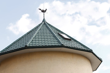 Image showing Round tower roof with a weathercock