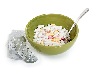 Image showing Pills in a green bowl