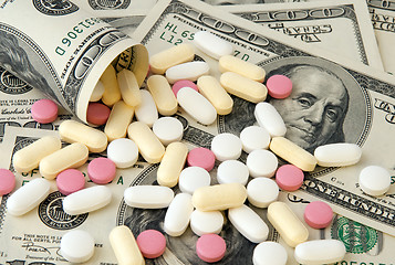 Image showing Pills and money