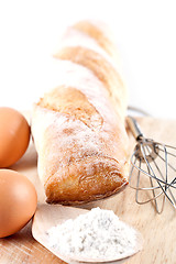 Image showing bread, flour, eggs and kitchen utensil