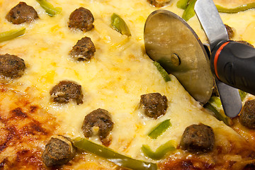 Image showing Meatball pizza-closeup