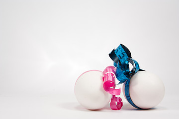Image showing Boy and girl egg with ribbons