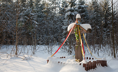 Image showing Old wooden cross snow wrapped