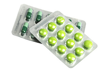 Image showing Green pills and capsules 