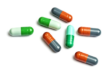 Image showing A few colorful capsules isolated on white 