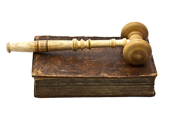 Image showing Old book and gavel isolated on white background 