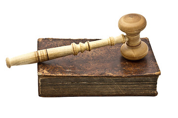 Image showing Old book and gavel isolated on white background 