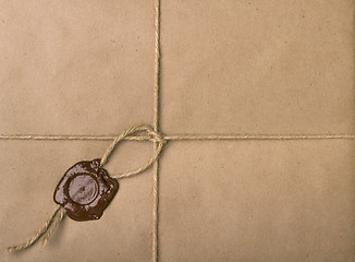 Image showing parcel with a rope and wax