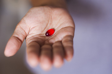 Image showing pill on hand