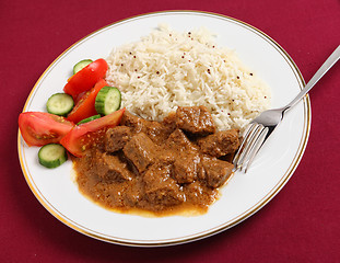 Image showing beef korma, basmati and salad meal