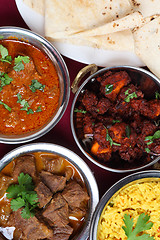 Image showing Indian curries from above