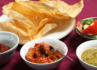 Image showing Chutney, papadums and salad