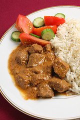 Image showing Beef korma and rice vertical