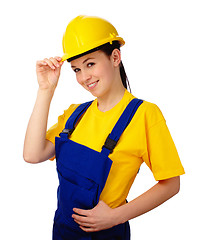 Image showing Young beautiful woman in construction uniform