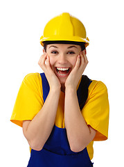 Image showing Construction girl holding her face in astonishment